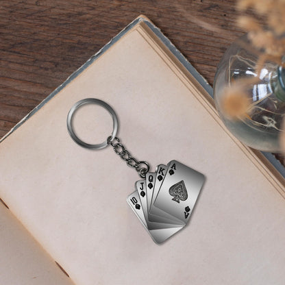 Close up of ZYZTA Silver Metal Card Deck Poker Keychain